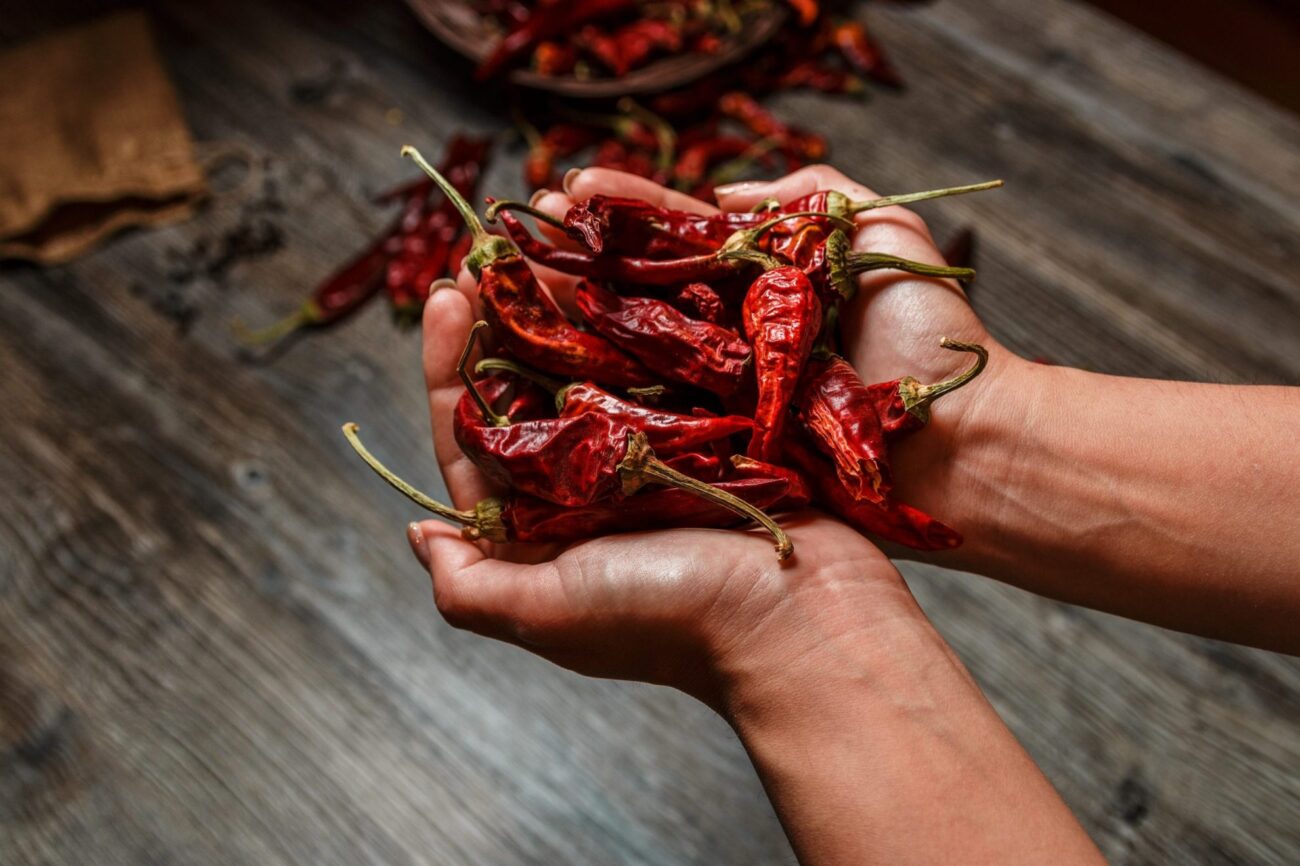 Photo of hands holding peppers illustrates blog: "What are chipotle peppers?