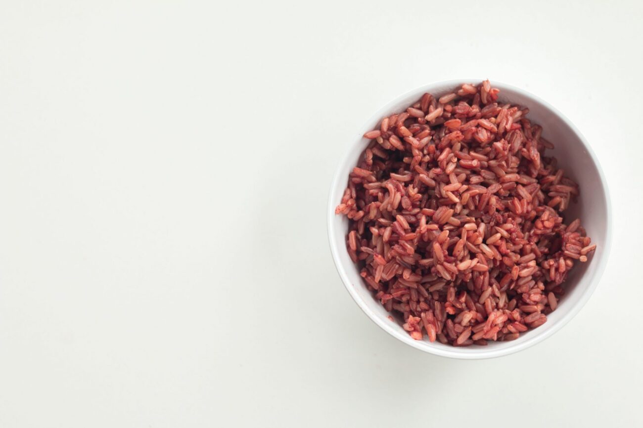 Bowl of red rice illustrates blog: What is red cargo rice?
