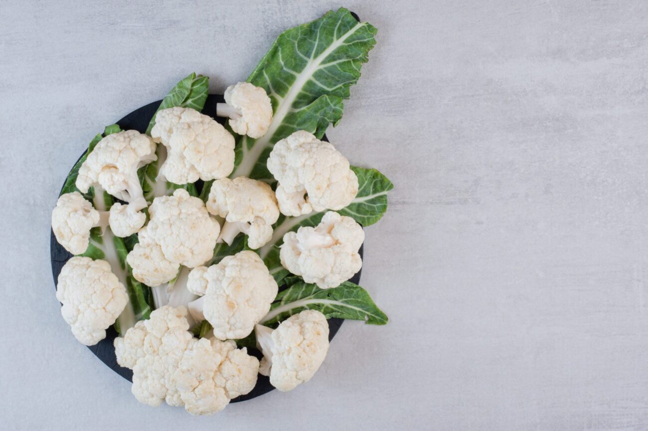 Bowl with cauliflower and leaves illustrates blog: