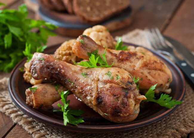 Photo of chicken leg with herbs illustrates blog: "Grilled Chicken: 3 Yummy Tips"