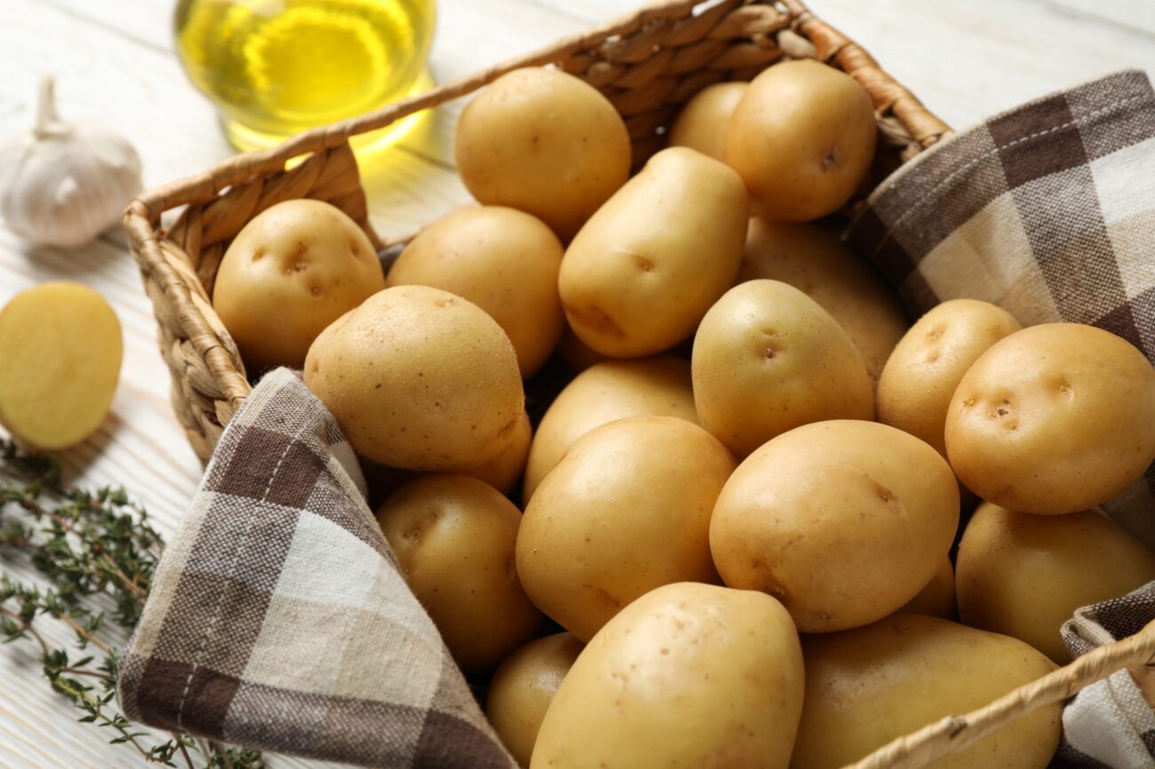 Basket filled with potatoes illustrates blog "Why Do Potatoes Turn Brown?"