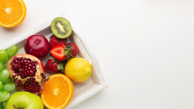 fruit-protein.fp Tray with fruit illustrates blog "What Fruits Are High in Protein?"