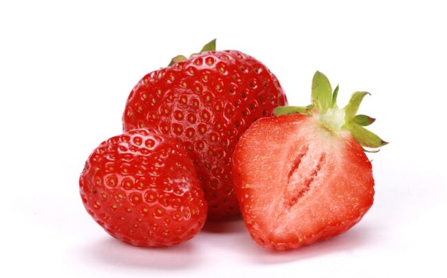 strawberries-wirestock Closeup of strawberries.