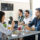 employees sharing lunch showing corporate catering benefits in the workplace