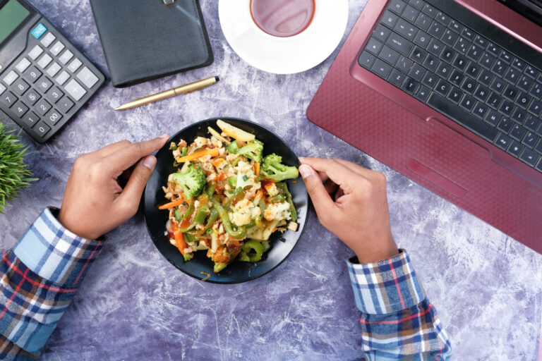 Office worker affected by skipping lunch at work and improving with meal prep